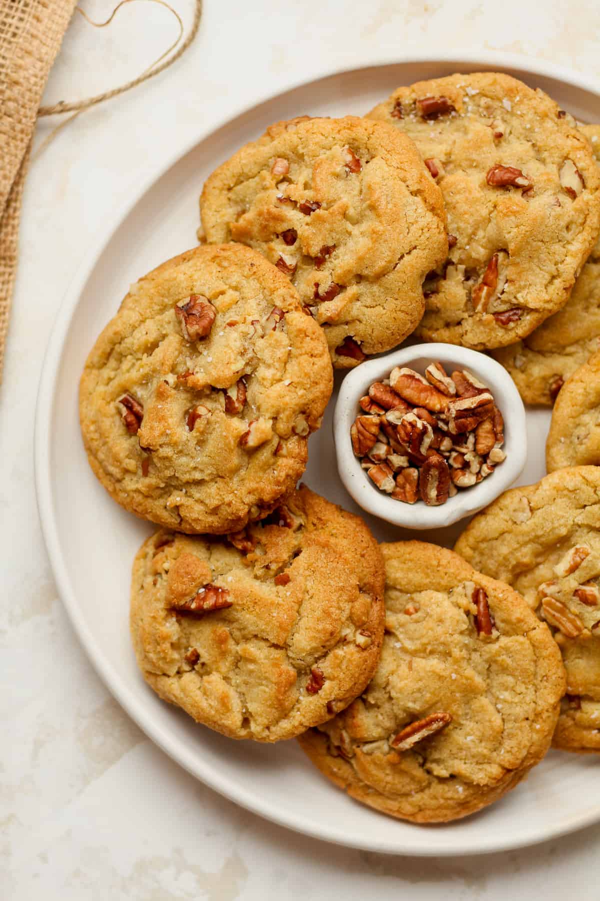 A plate of brown butter pecan cookies.