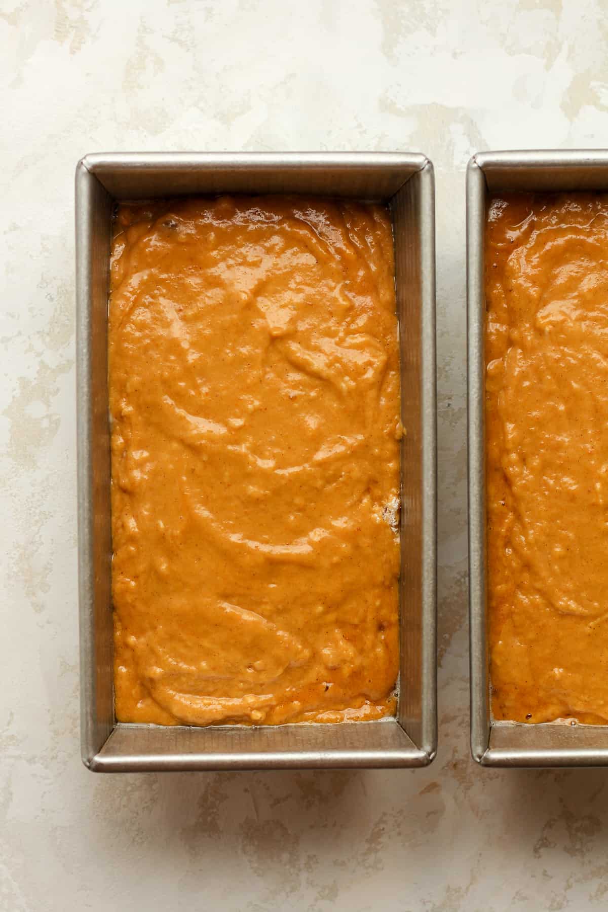 The pumpkin batter in loaf pans.