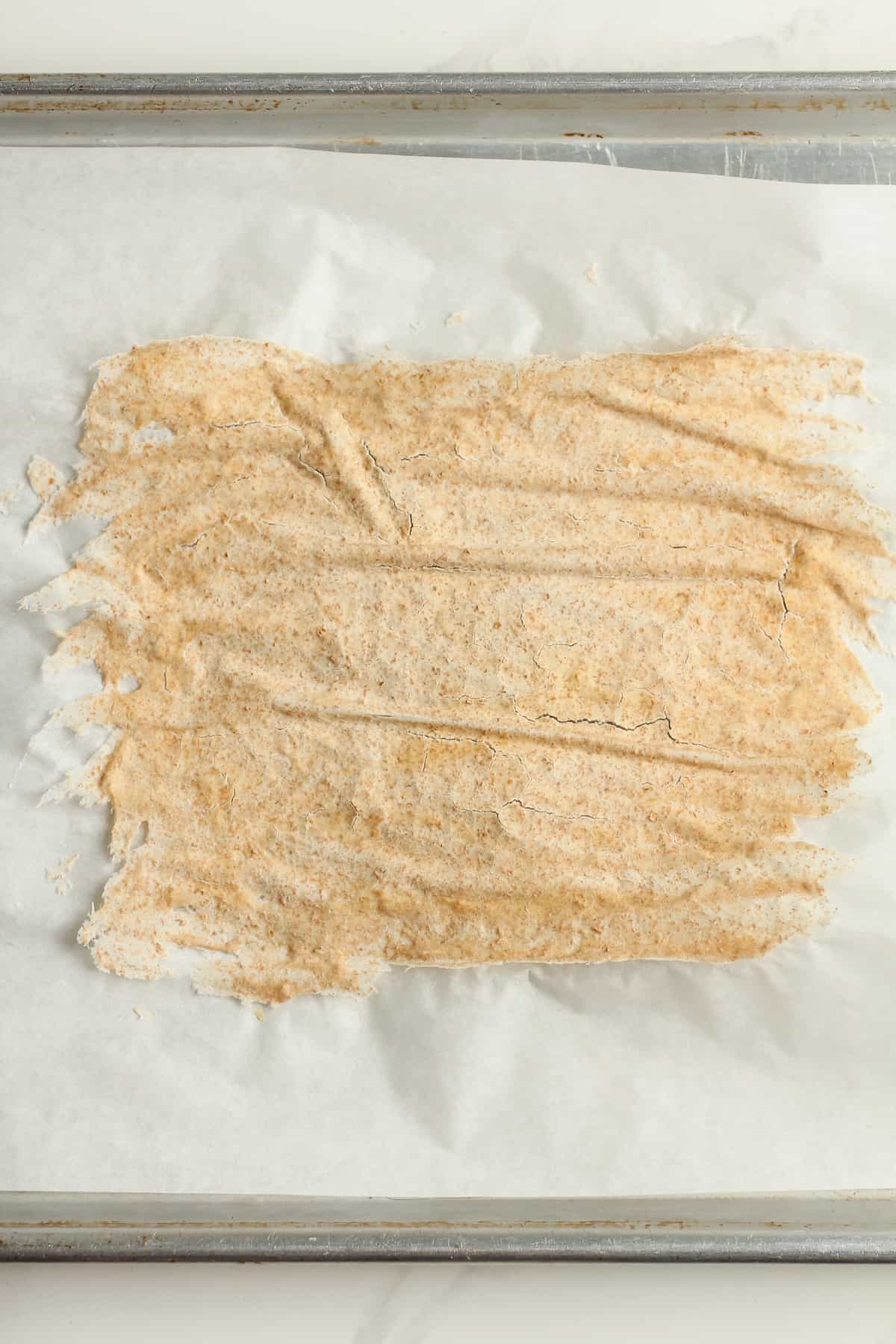 The dried starter on some parchment paper.