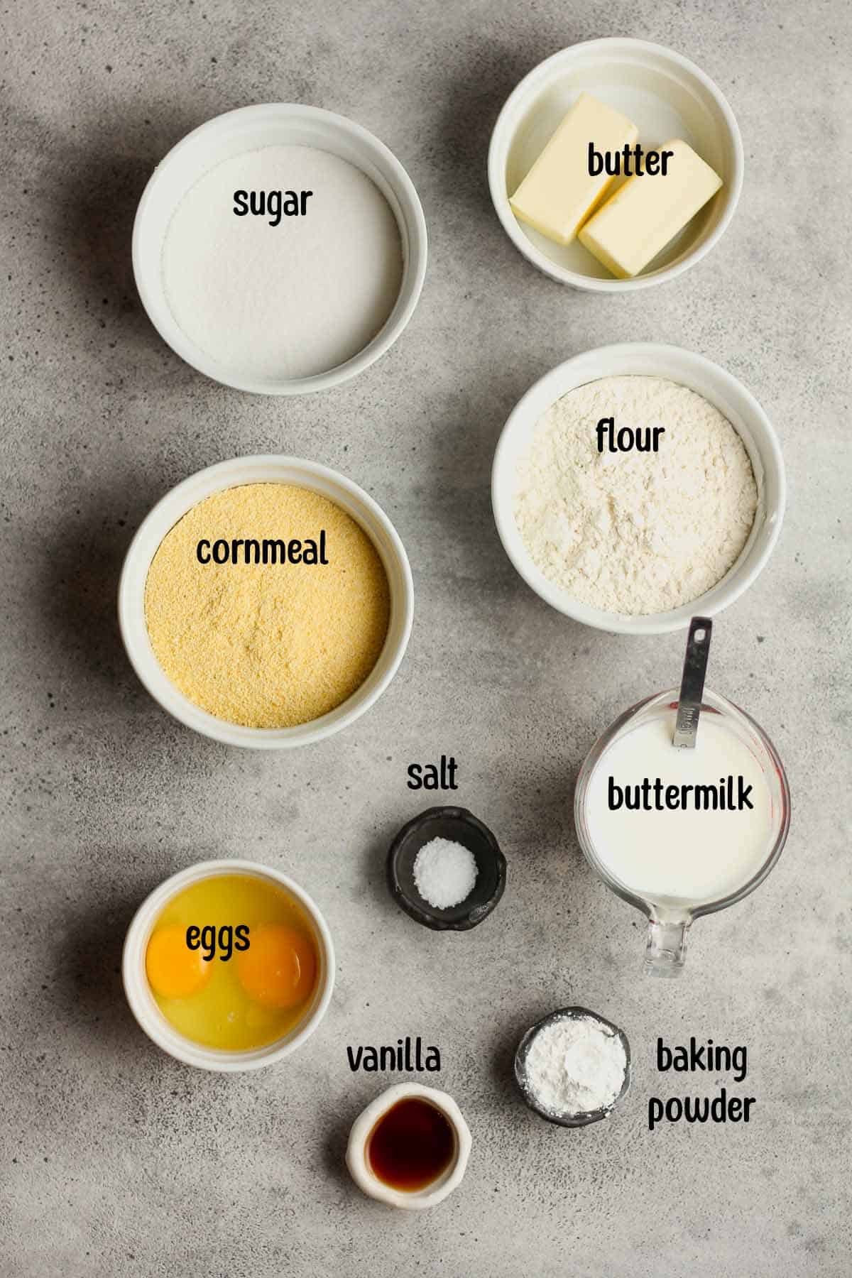 The cornbread ingredients in small bowls.