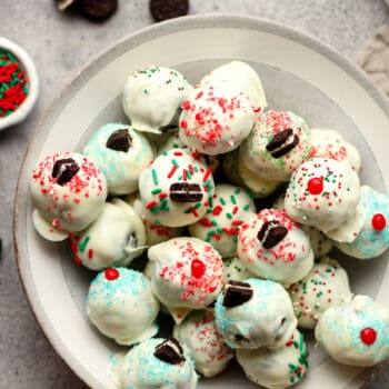 A bowl of white chocolate Oreo truffles.