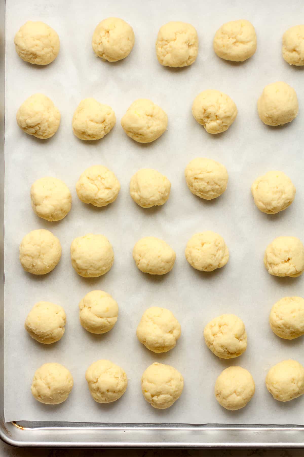 A pan of the cookie dough balls.