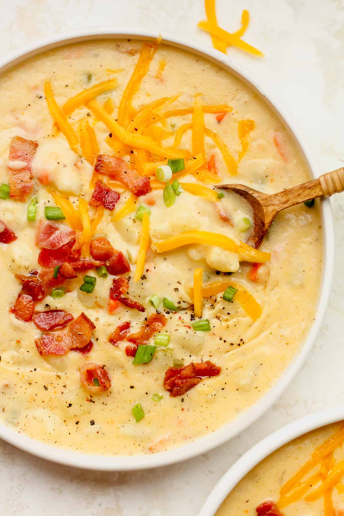 Closeup of a bowl of potato soup with bacon.