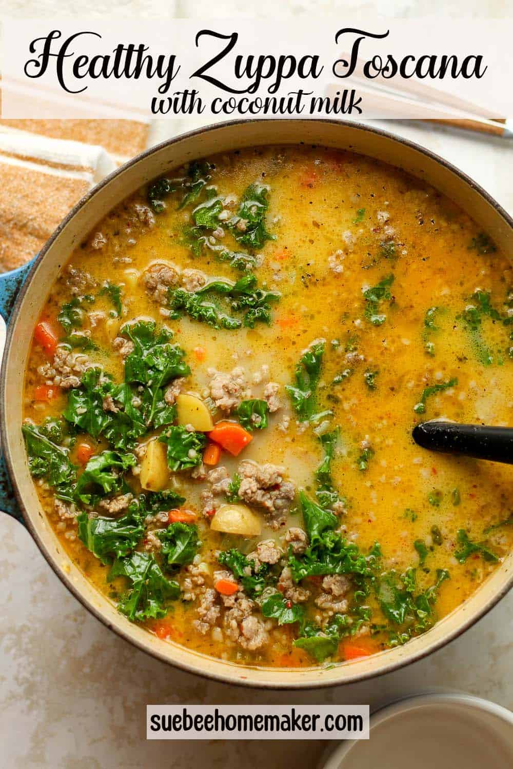 A large pot of healthy Zuppa Toscana with coconut milk.