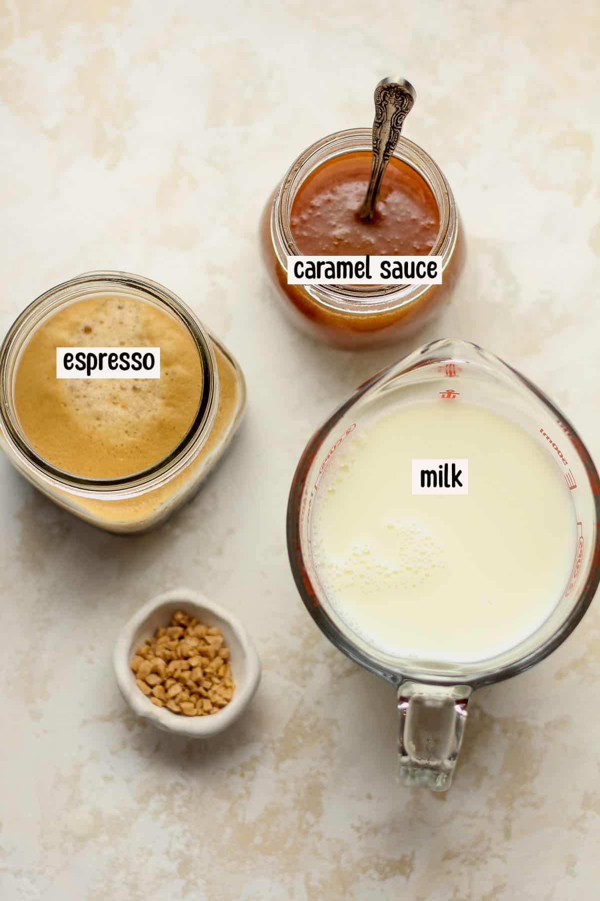 The ingredients, labeled, for a caramel latte.