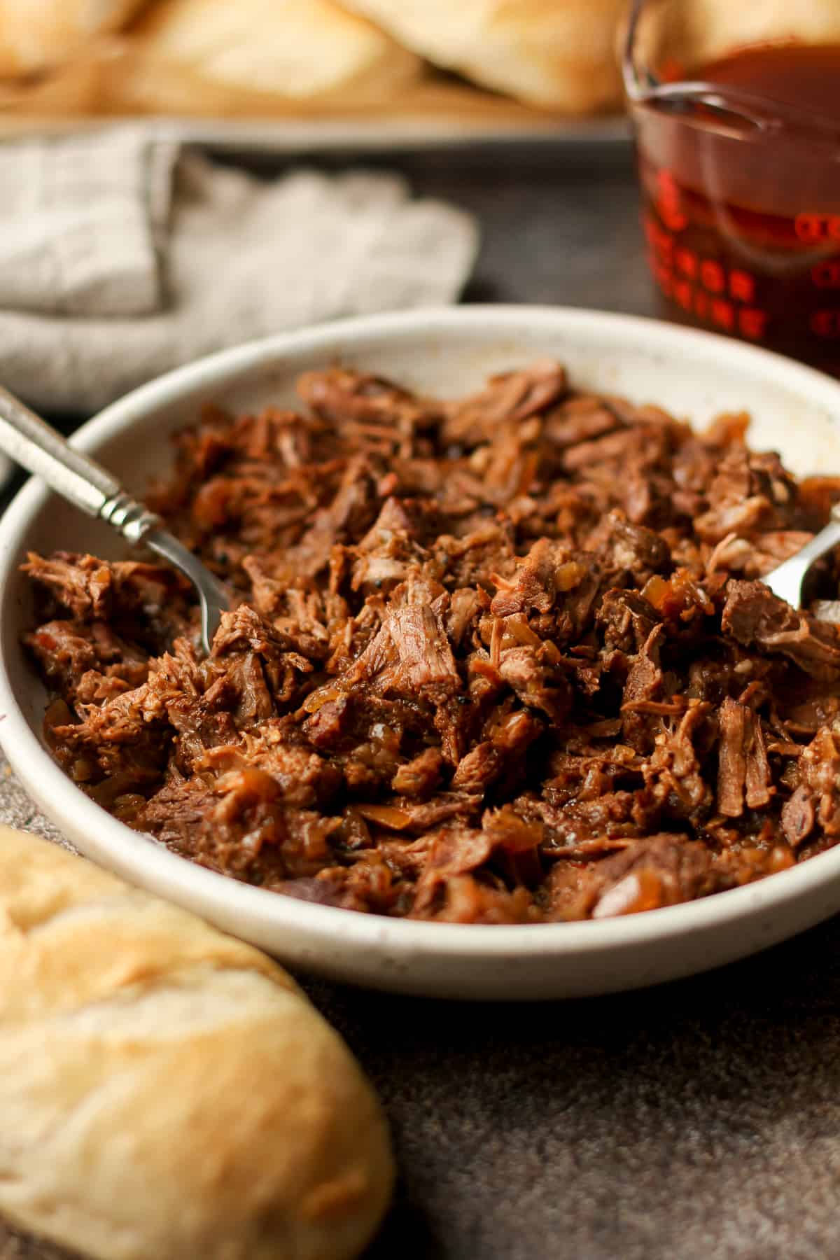 Side view of a bowl of shredded beef.