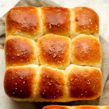 The baked brioche dinner rolls with sesame seeds.
