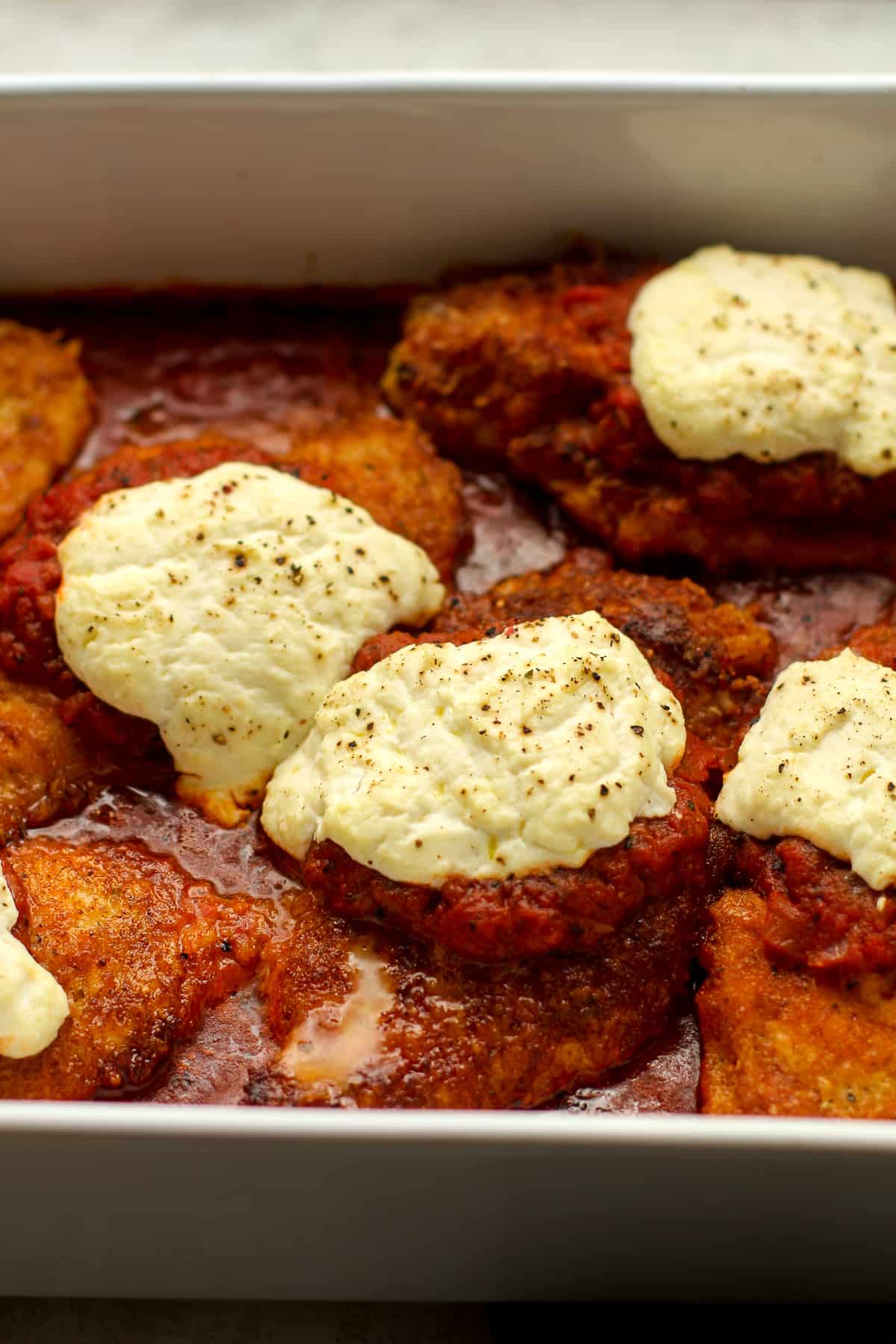 Side view of some classic chicken parmesan.