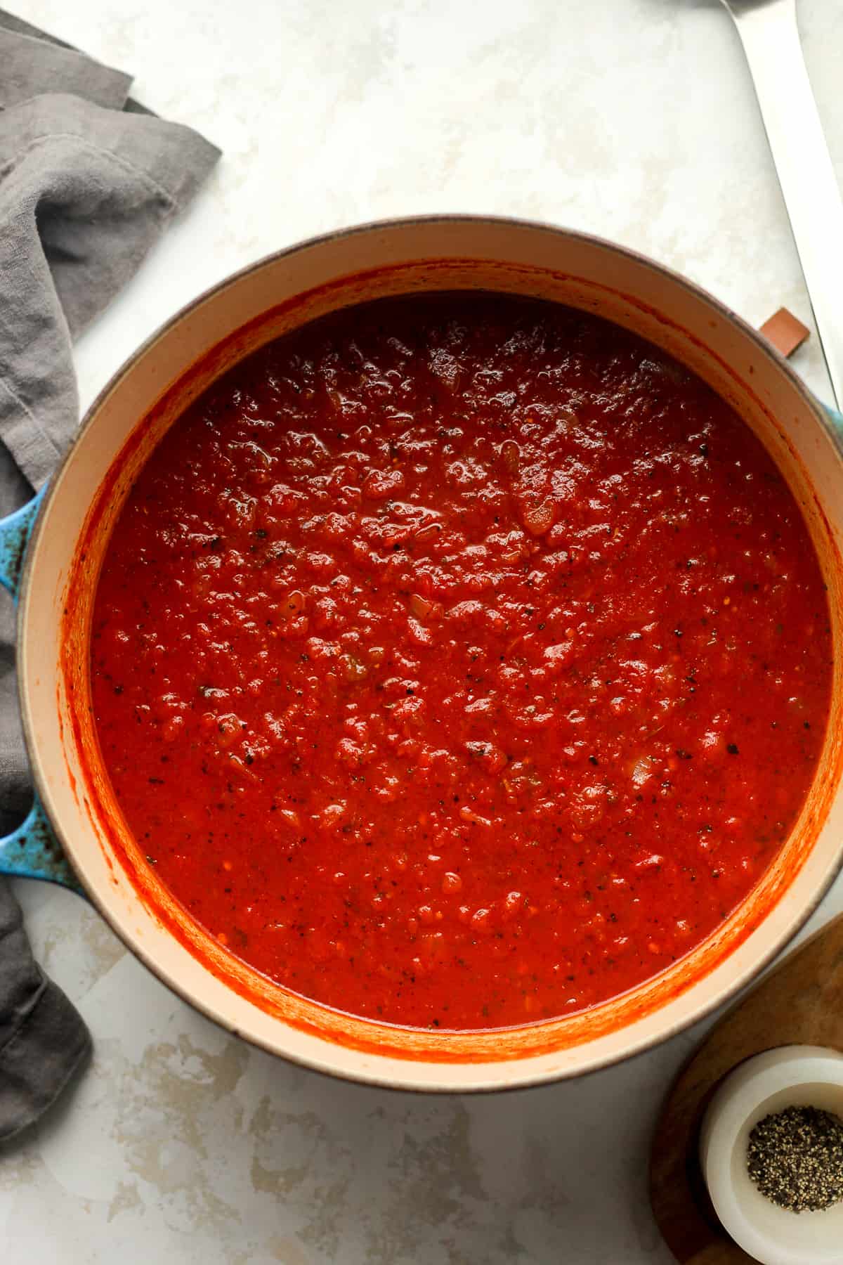 Overhead view of a stock pot of homemade Sauce.