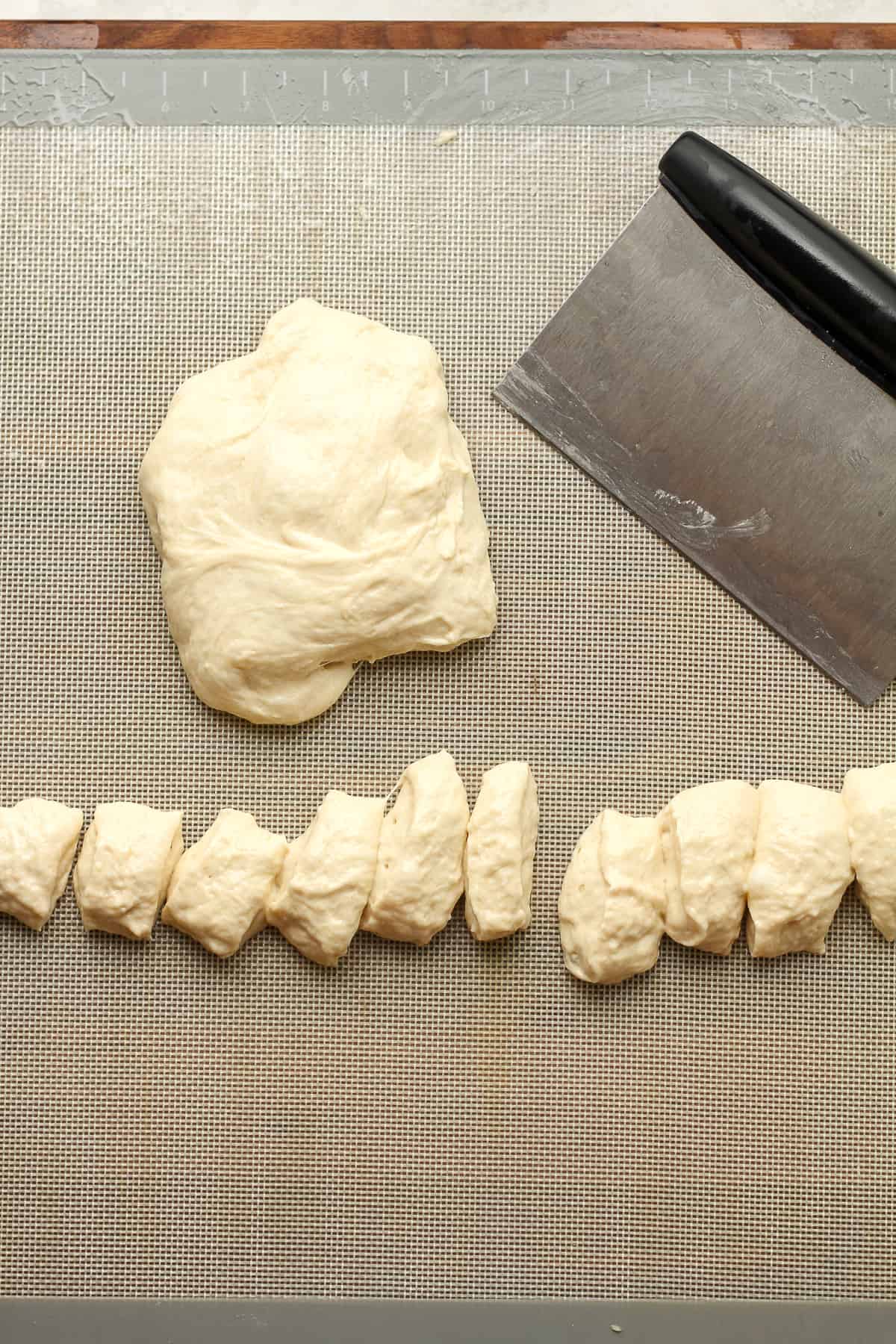 Some pretzel dough cut into bite-sized pieces.
