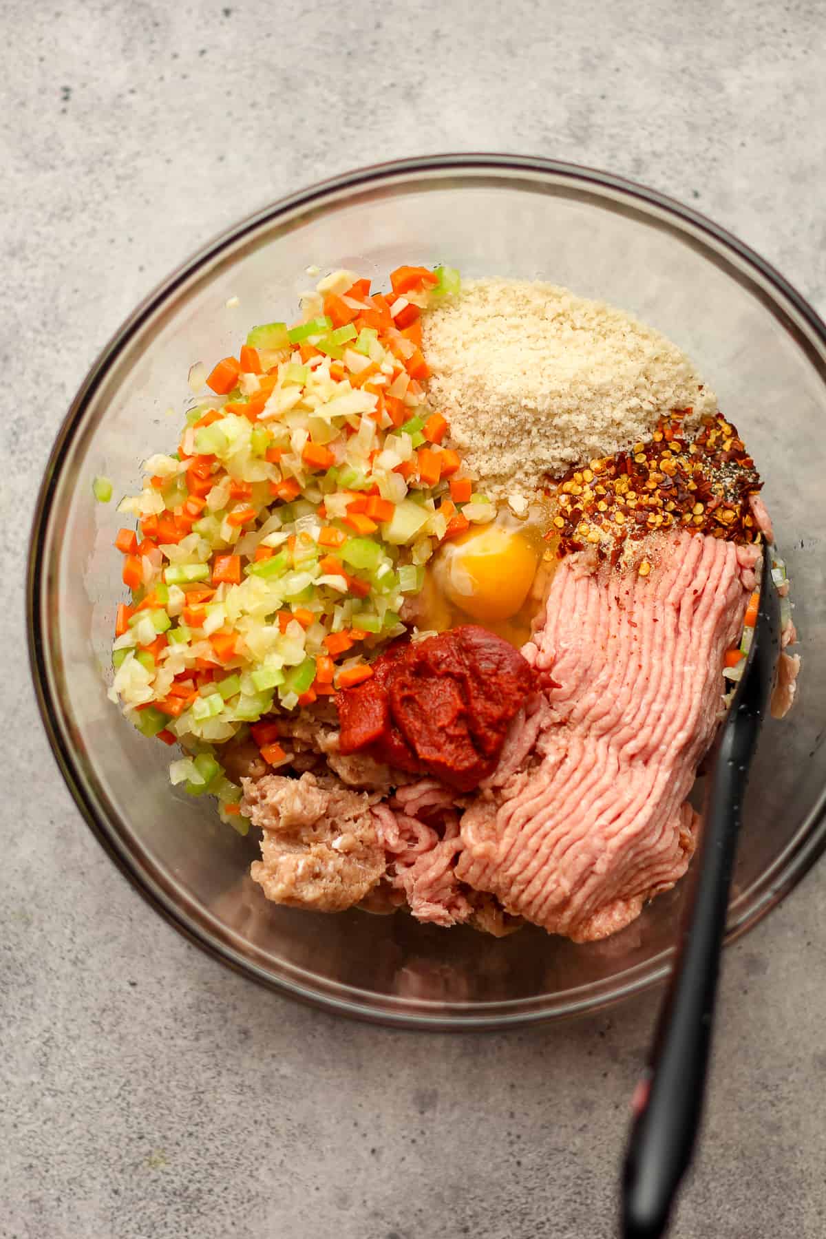 A bowl of the meatloaf ingredients before combining.