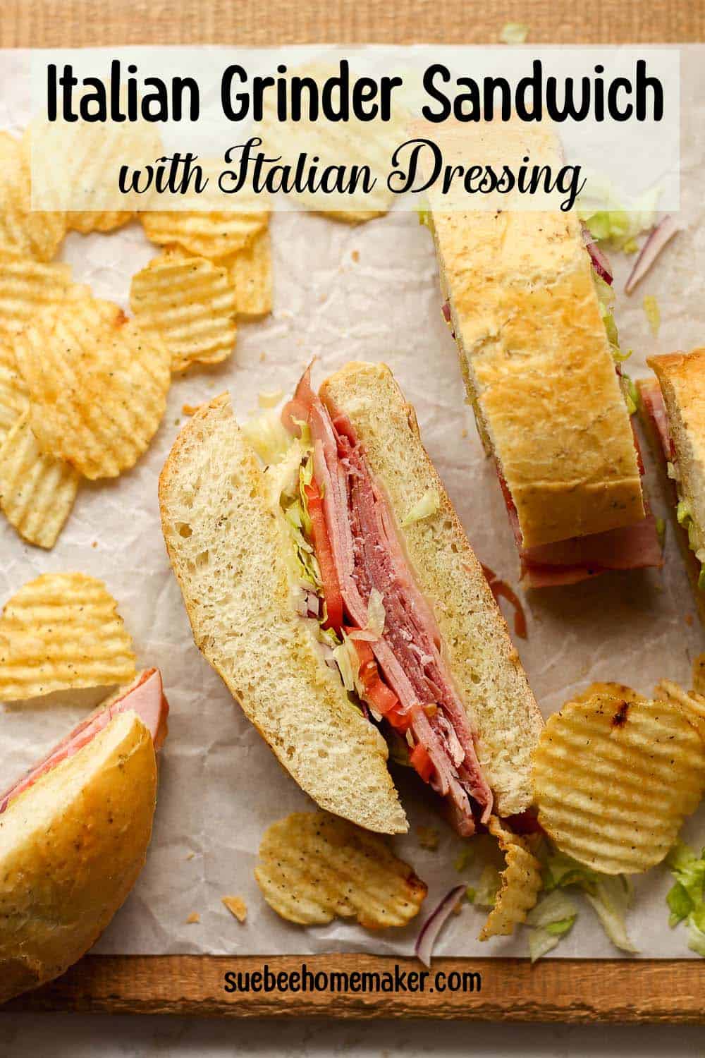 Some sliced Italian grinder sandwiches with chips.