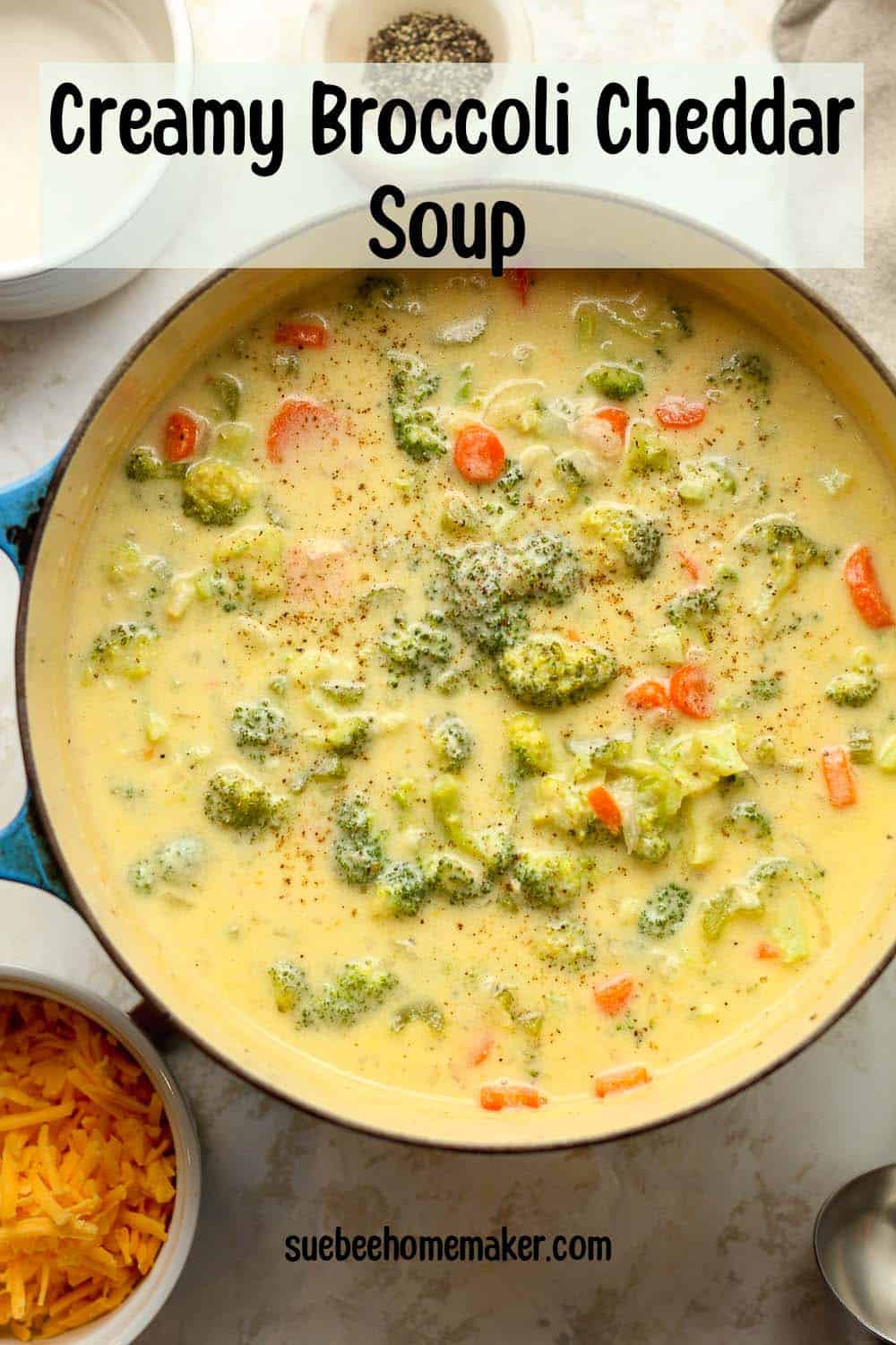 A stock pot of broccoli cheddar soup.