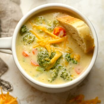 A mug of broccoli cheddar soup.