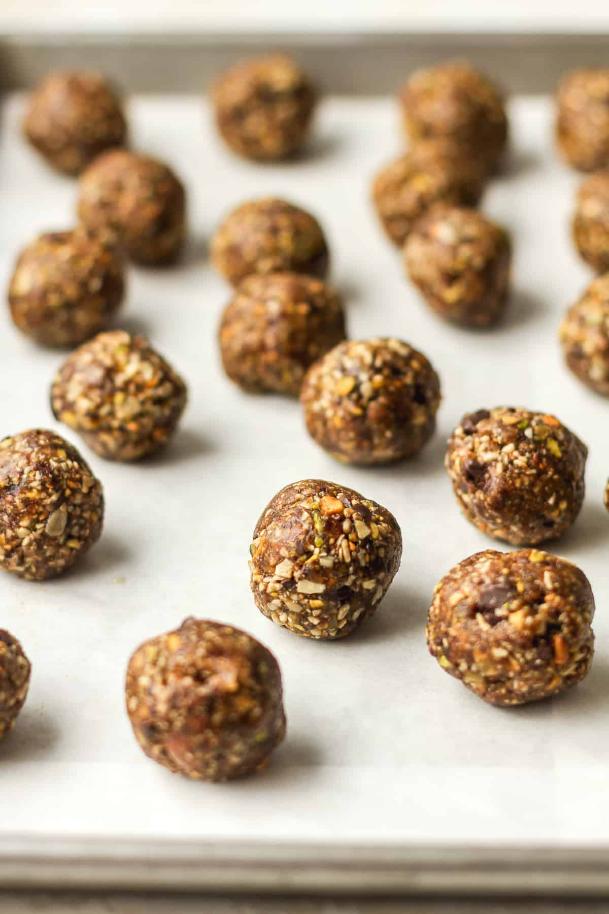 Side view of date nut balls on a tray.