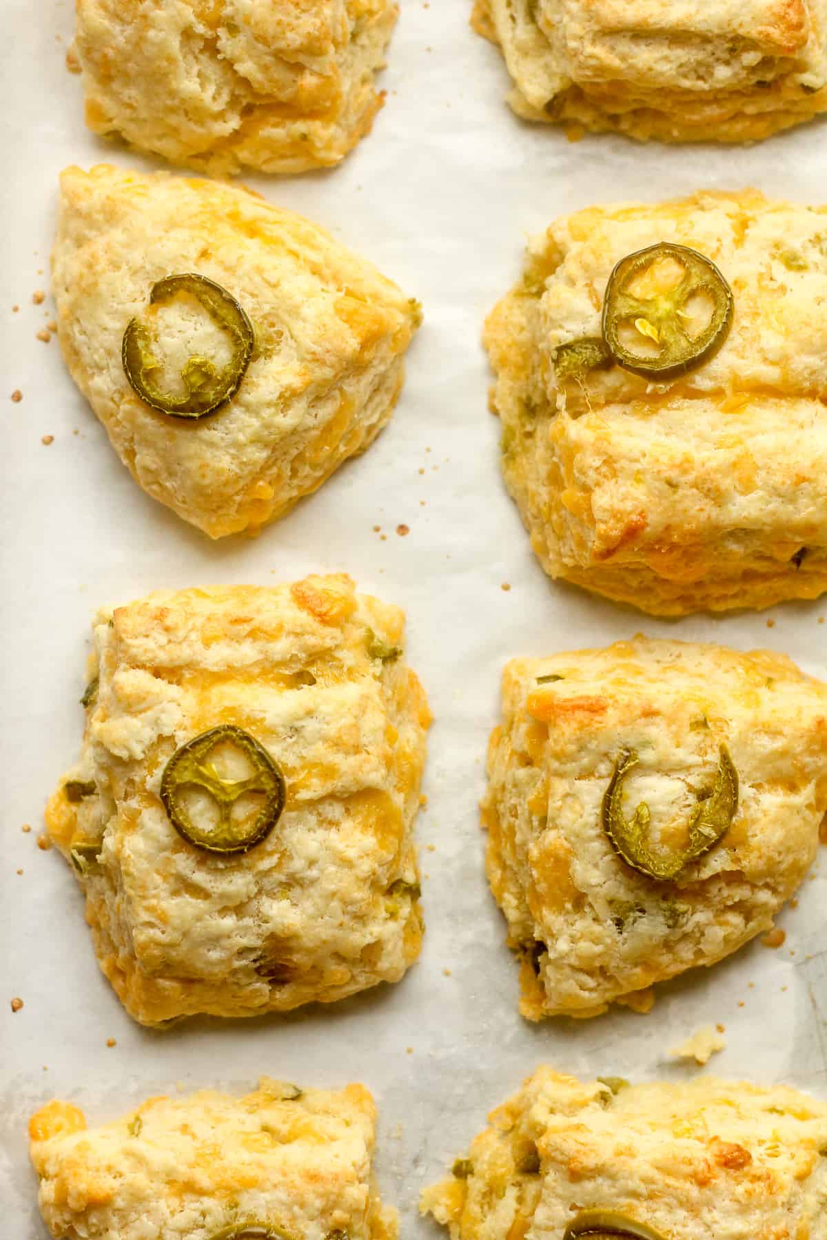 Closeup on some cheddar biscuits with jalapeños.