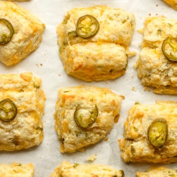 Closeup on some jalapeño cheddar biscuits.