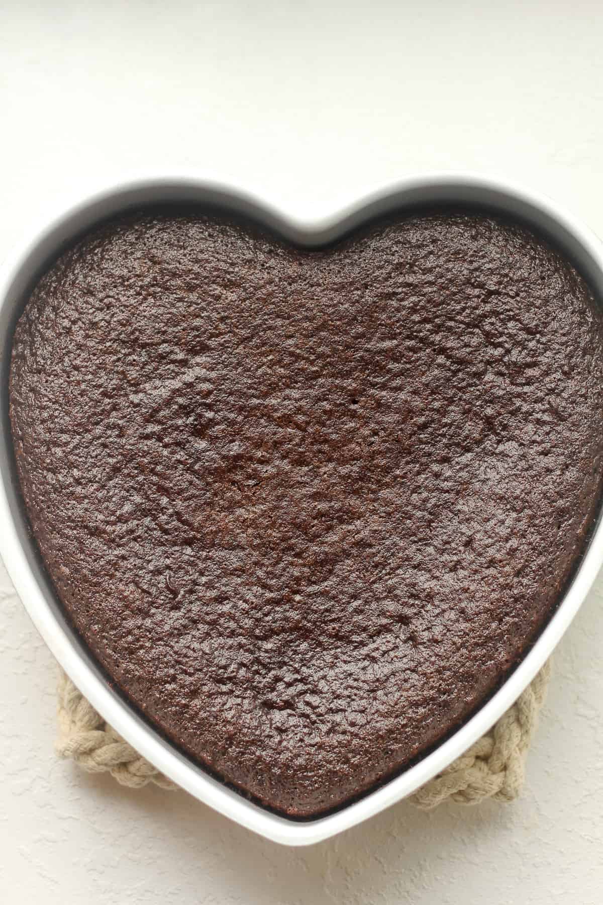 A heart pan with chocolate cake.