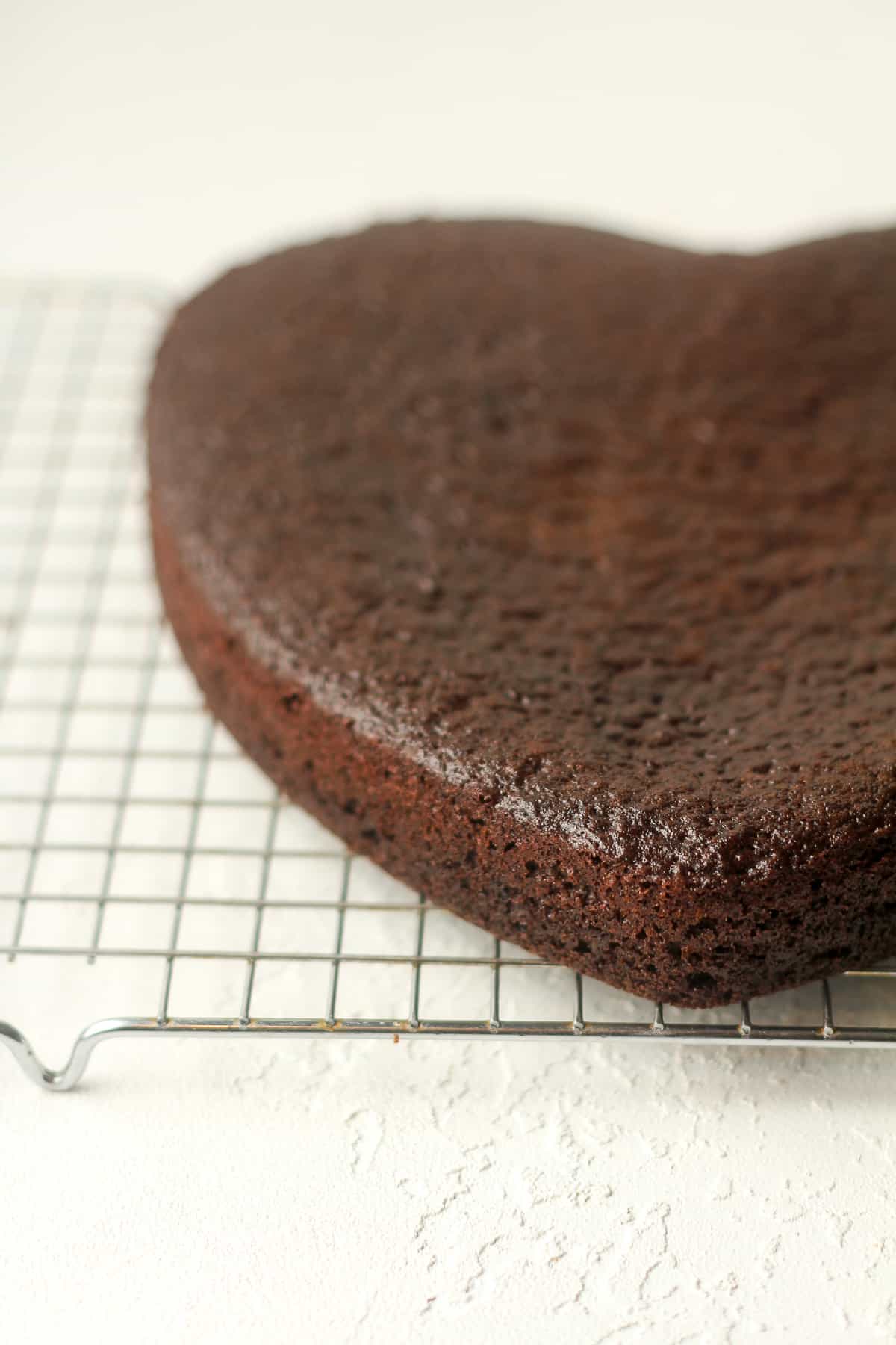 Side view of a chocolate heart cake.