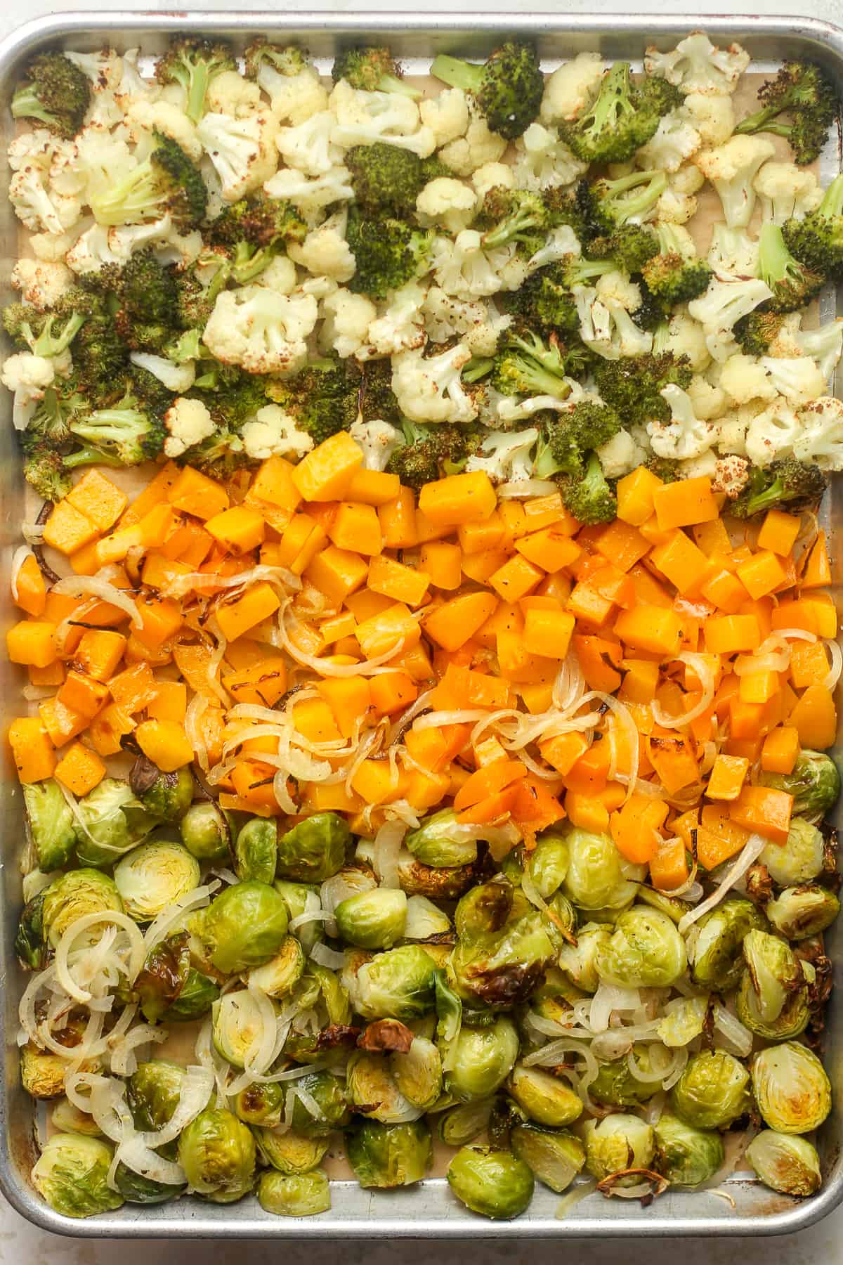 A pan of the roasted veggies by ingredient.