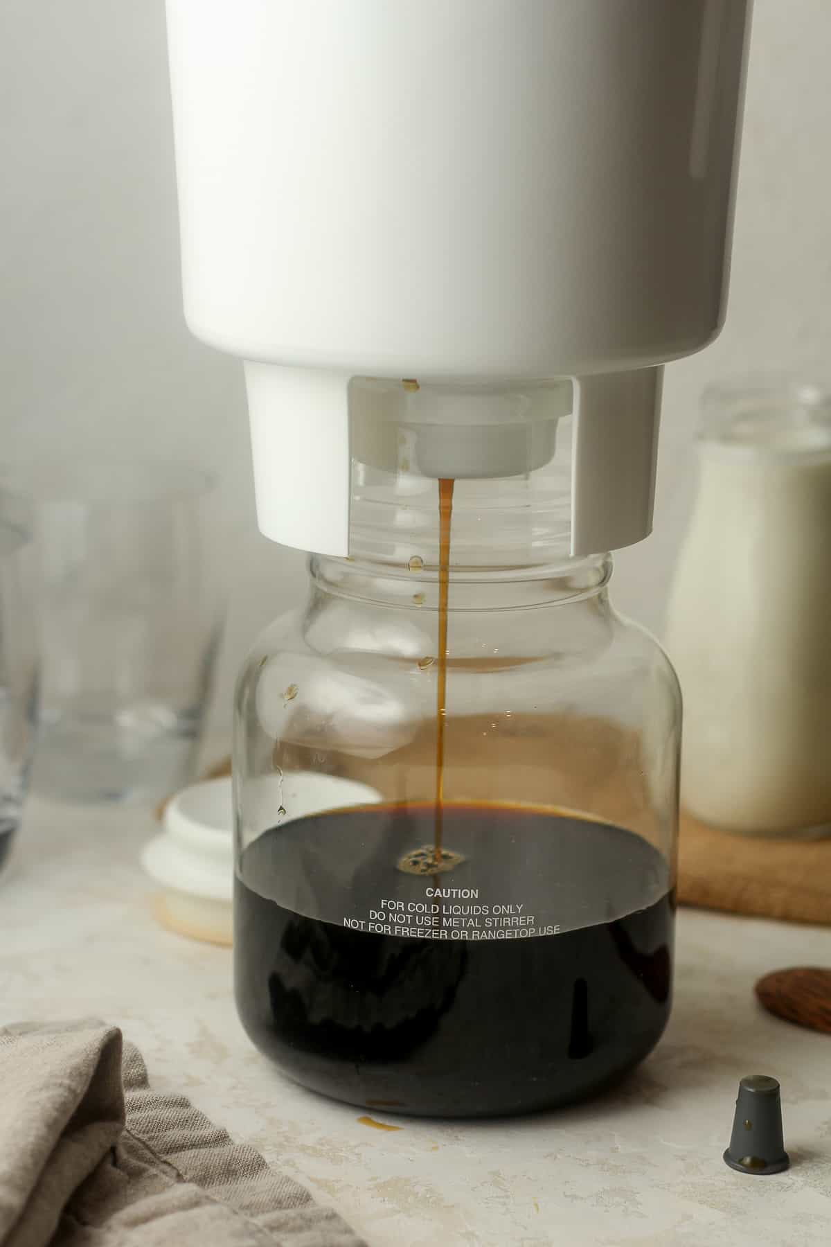 The Toddy maker brewing cold brew in a carafe.