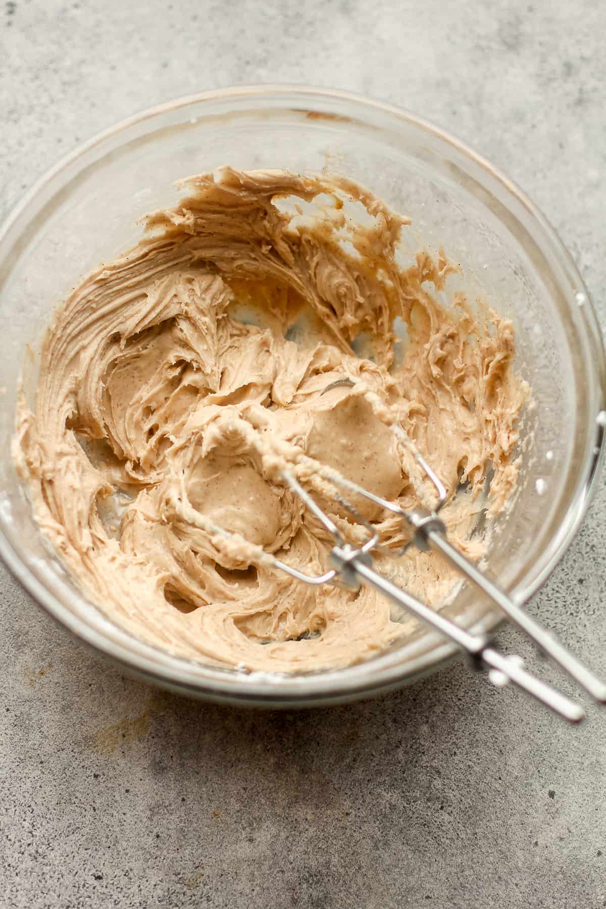 A bowl of the cinnamon maple icing.