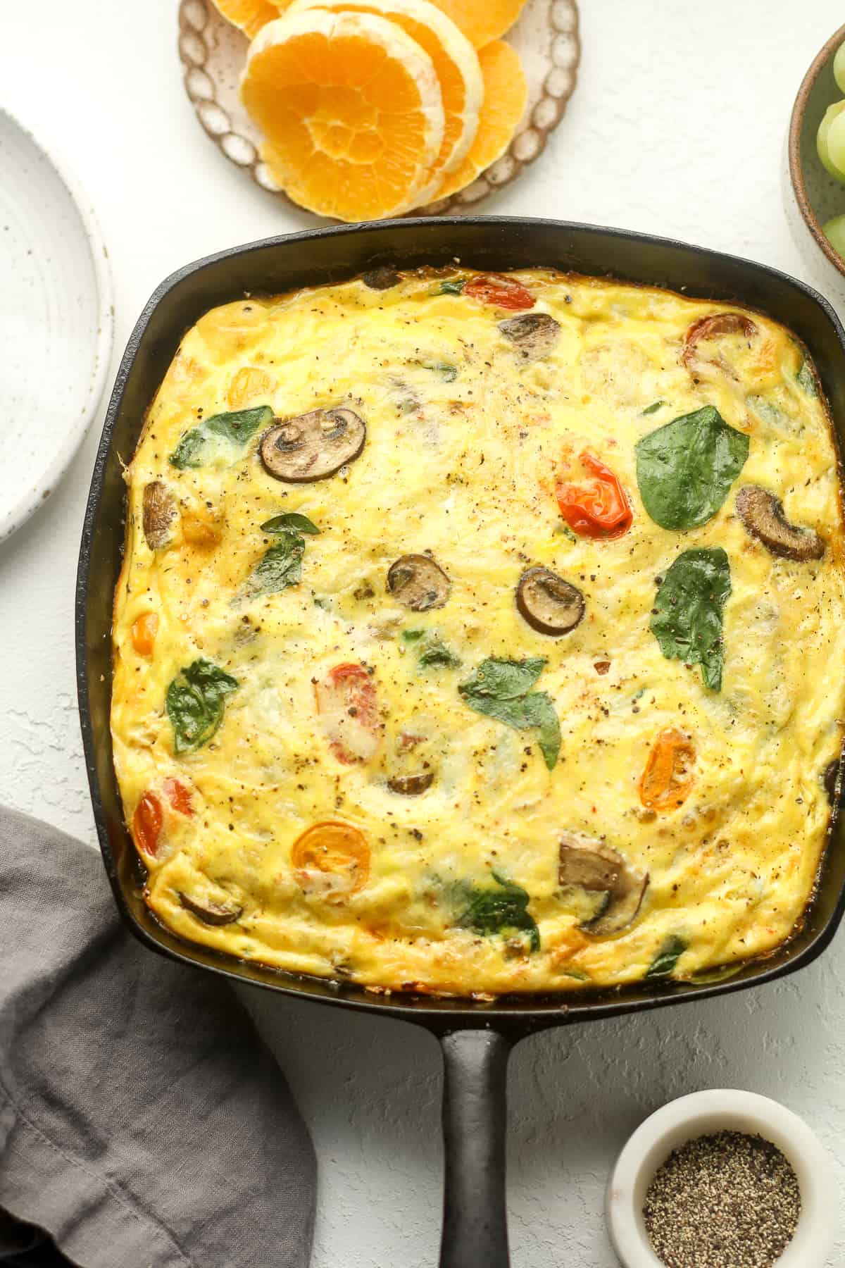 A skillet of veggie frittata with havarti cheese.