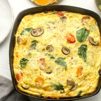 A vegetable frittata in a cast iron pan.