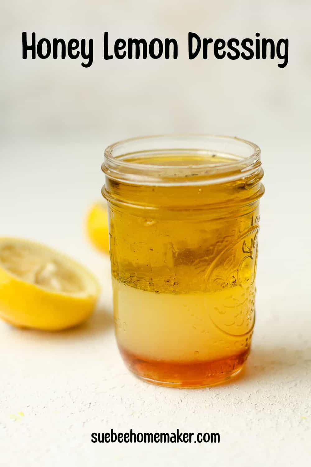 A jar of honey lemon dressing.