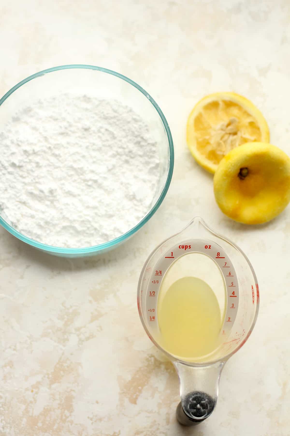 The powdered sugar with a squeezed lemon.