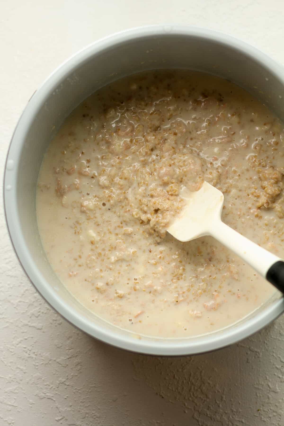The steel cut oats with liquids added.