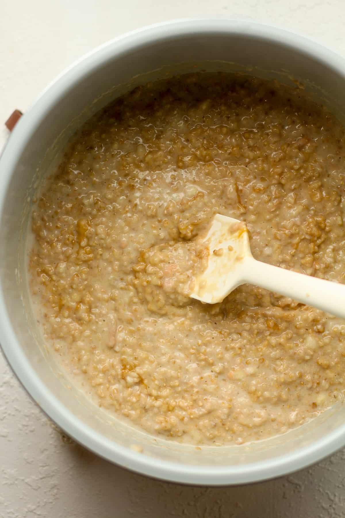 An instant pot bowl with the steel cut oats.