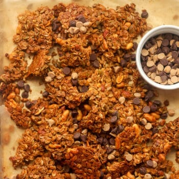 A sheet pan of peanut butter granola with chocolate chips.