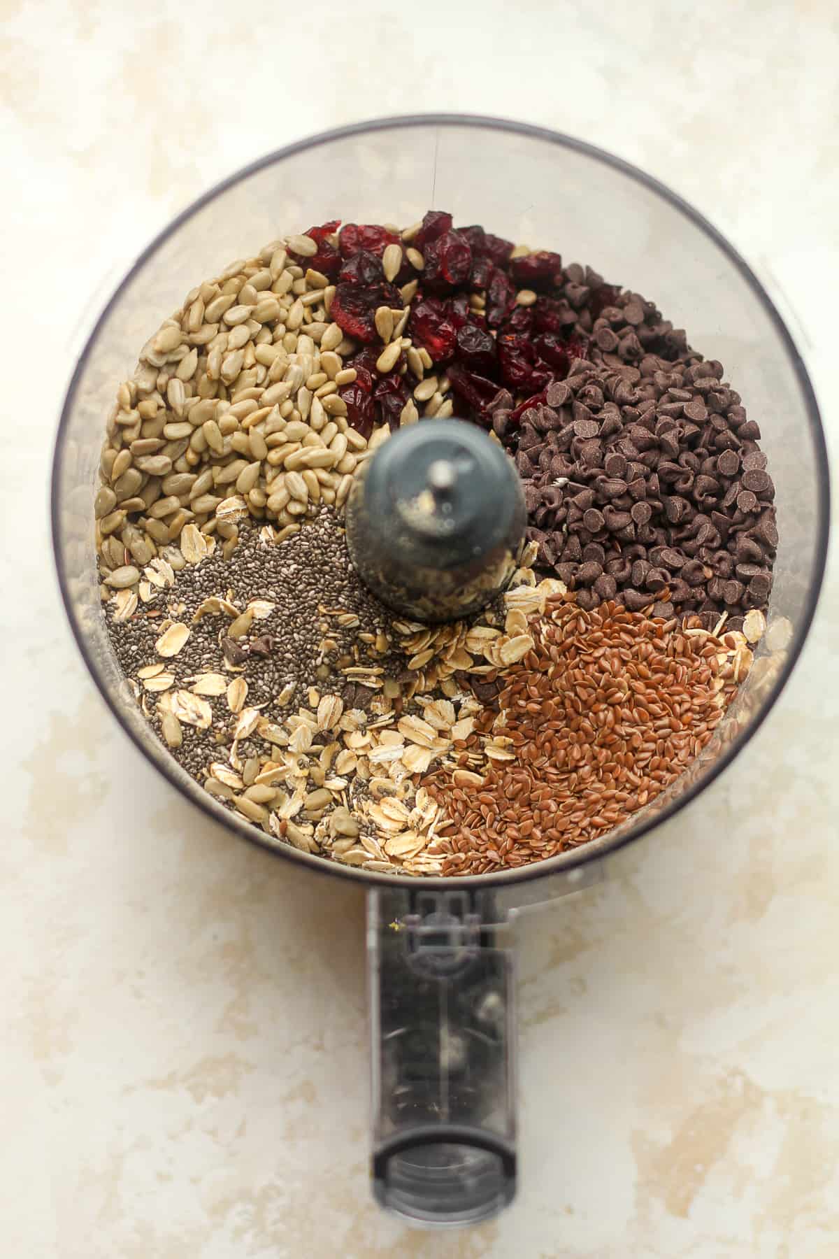 The food processor of the dry ingredients, separated by ingredient.