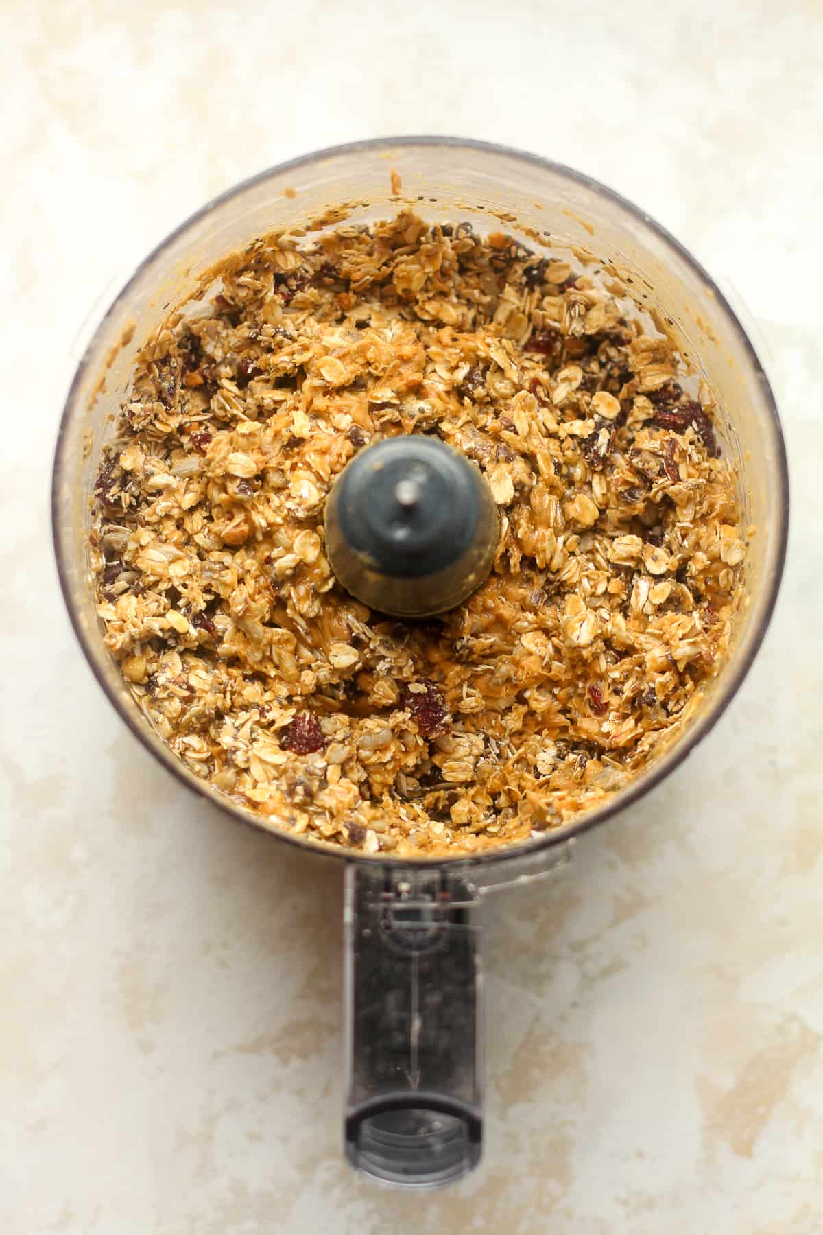 A food processor of the mixed power ball ingredients.