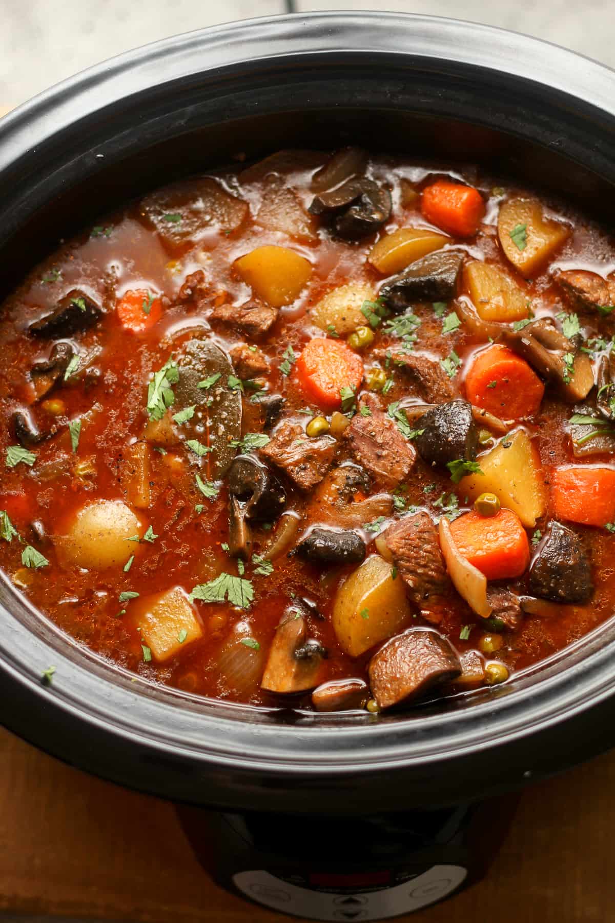 A slow cooker full of beef stew.