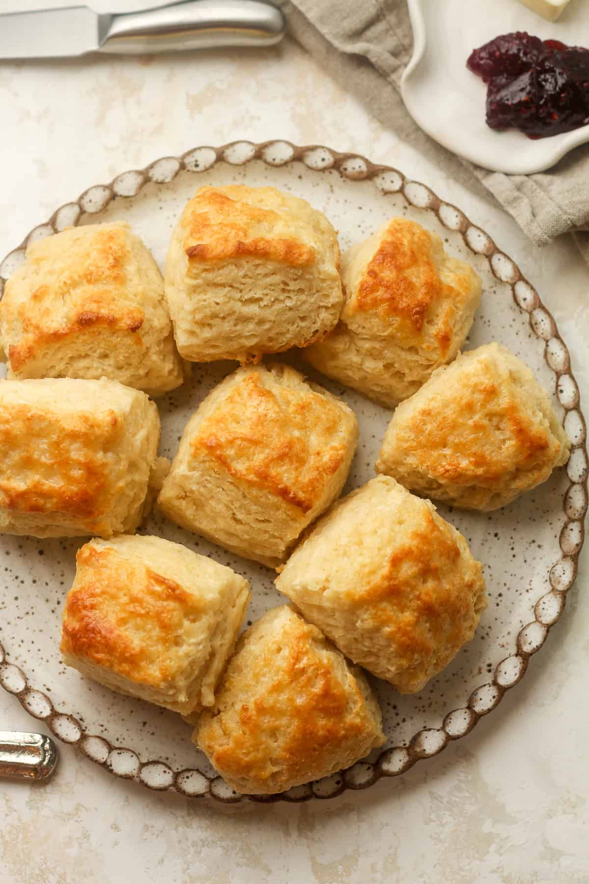 Overhead view of a plate of buttermilk biscuits.