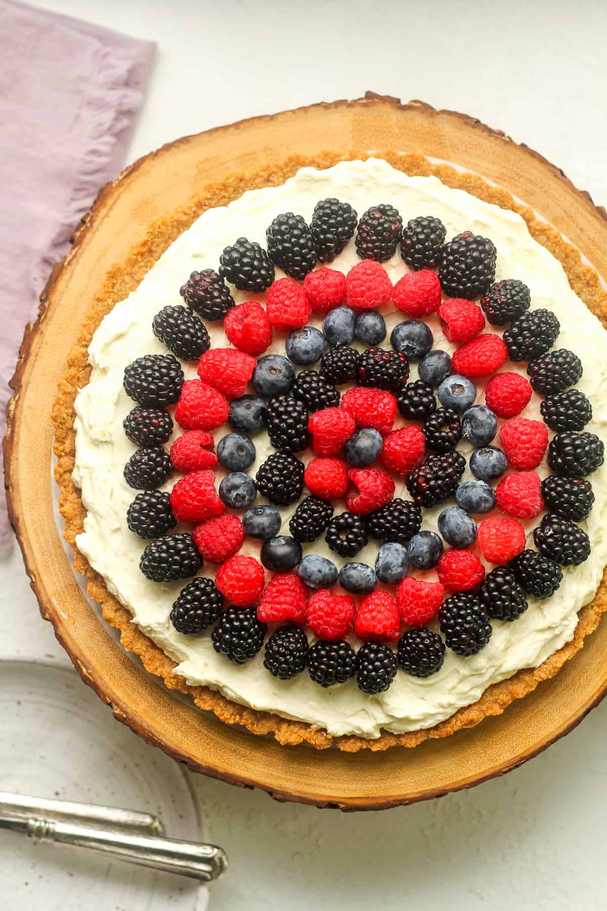 A just made fruit tart with cream cheese filling.