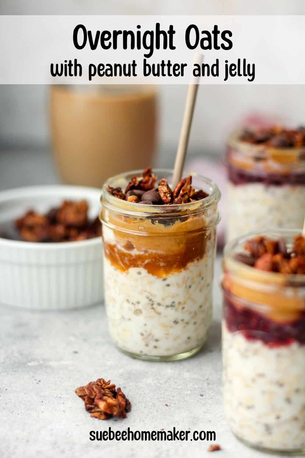 Side view of three mason jars of overnight oats with peanut butter and jelly plus granola.