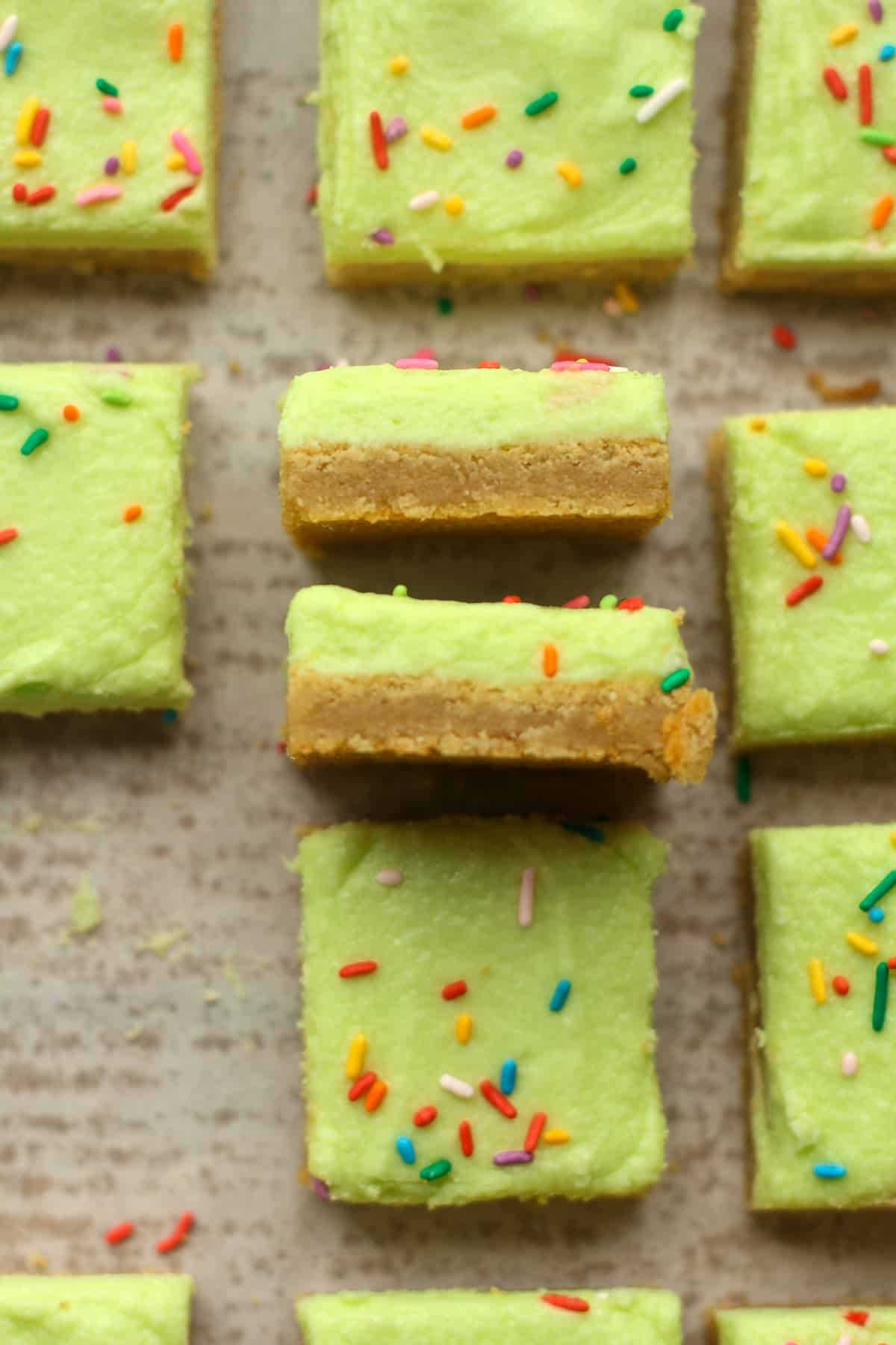 Overhead view of some blondie squares with two stacked on their sides.