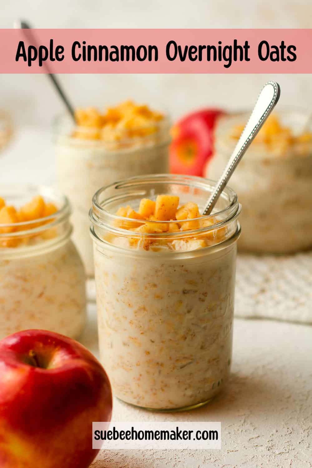 Side view of several jars of apple cinnamon overnight oatmeal.