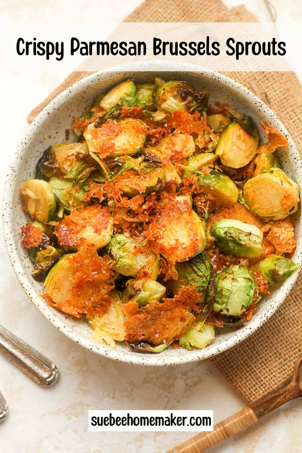 A bowl of brussels sprouts with parmesan cheese.