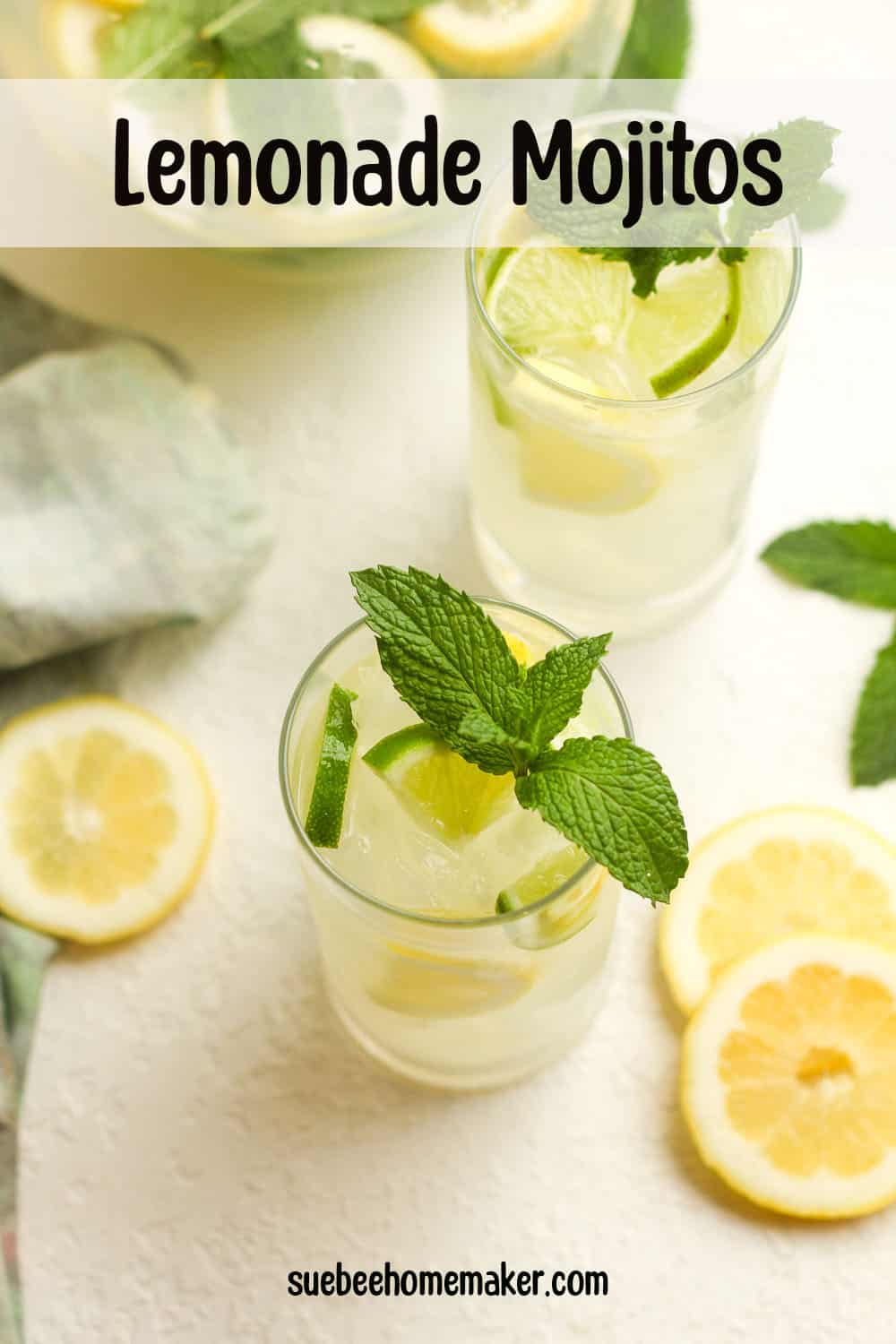 An overhead shot of two glasses of lemonade mojitos.