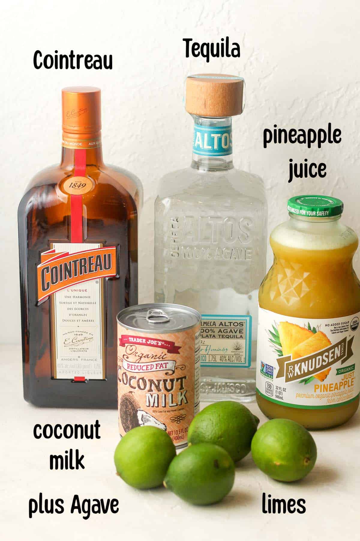 Side view of the pineapple coconut margarita ingredients.