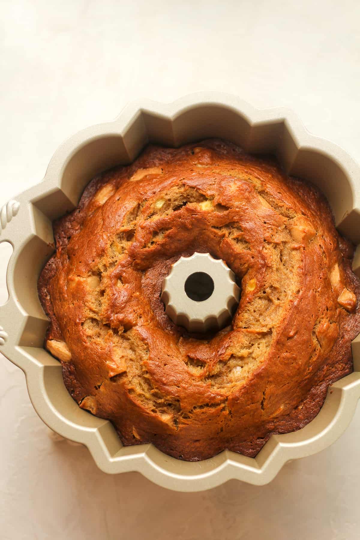 The baked cake in the bundt pan.