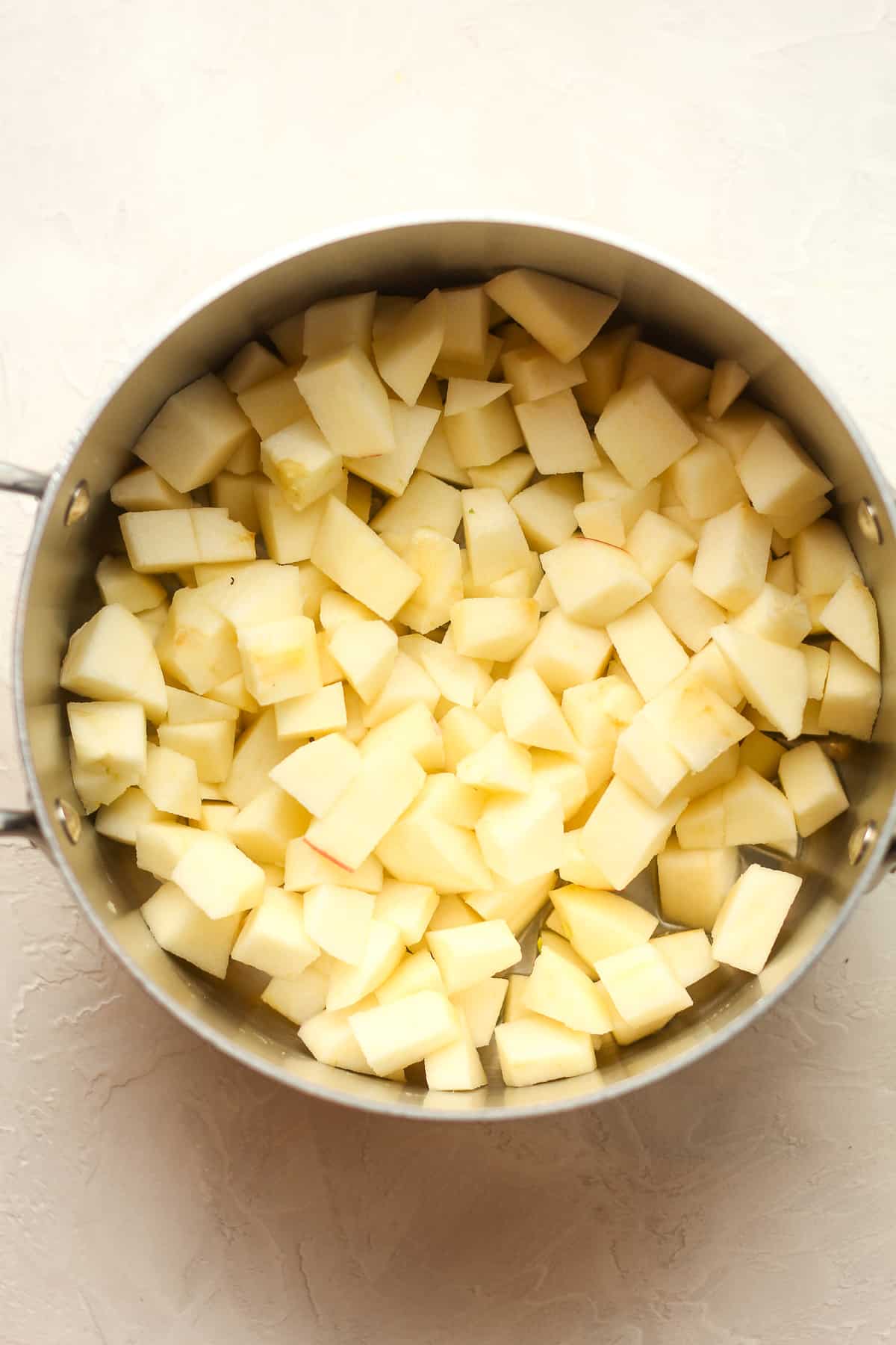 A pan of the chopped apples.