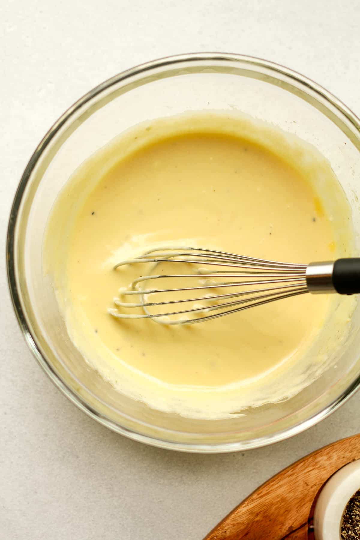 A bowl of the dressing after whisking.