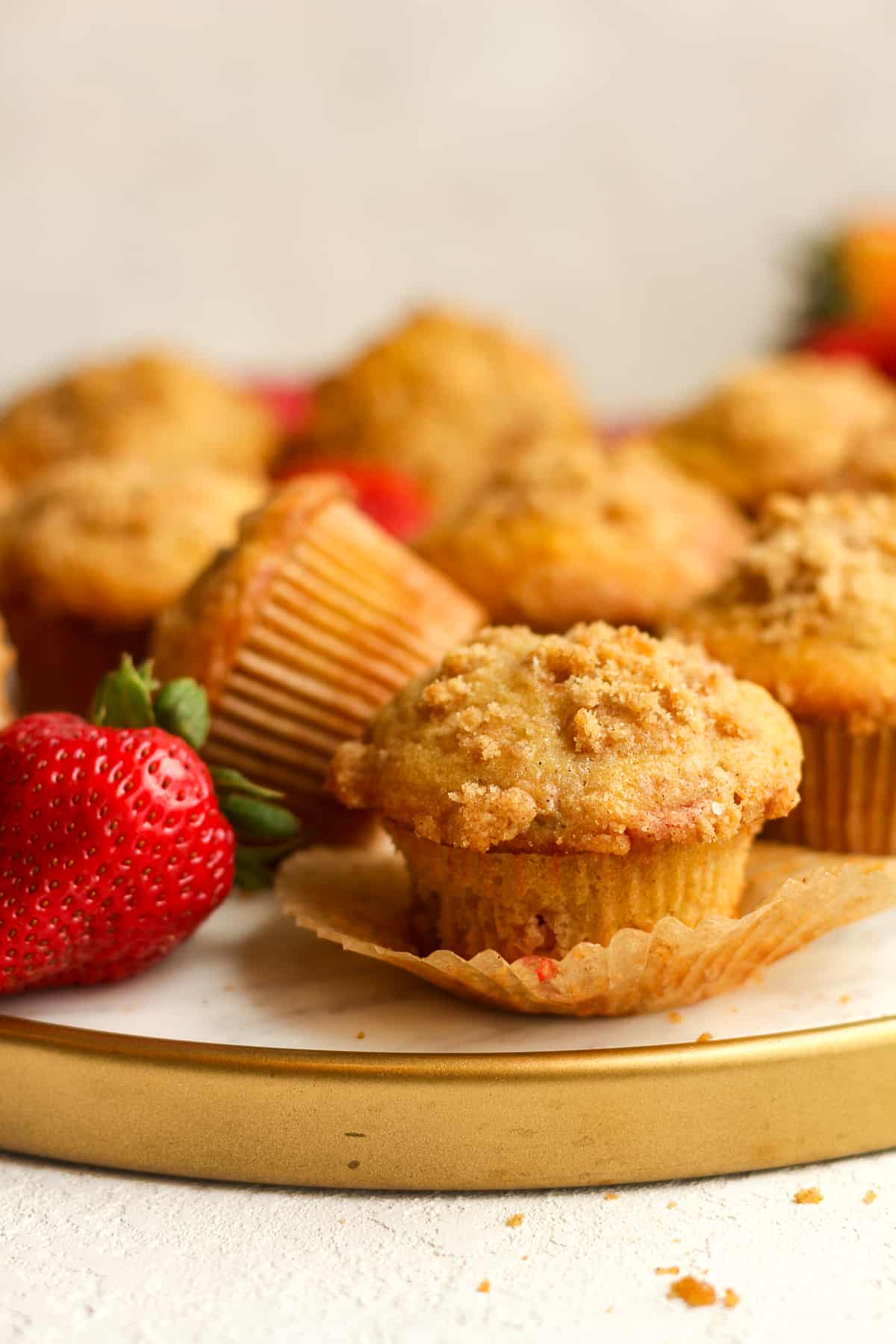 Side view of a tray of streusel muffins.