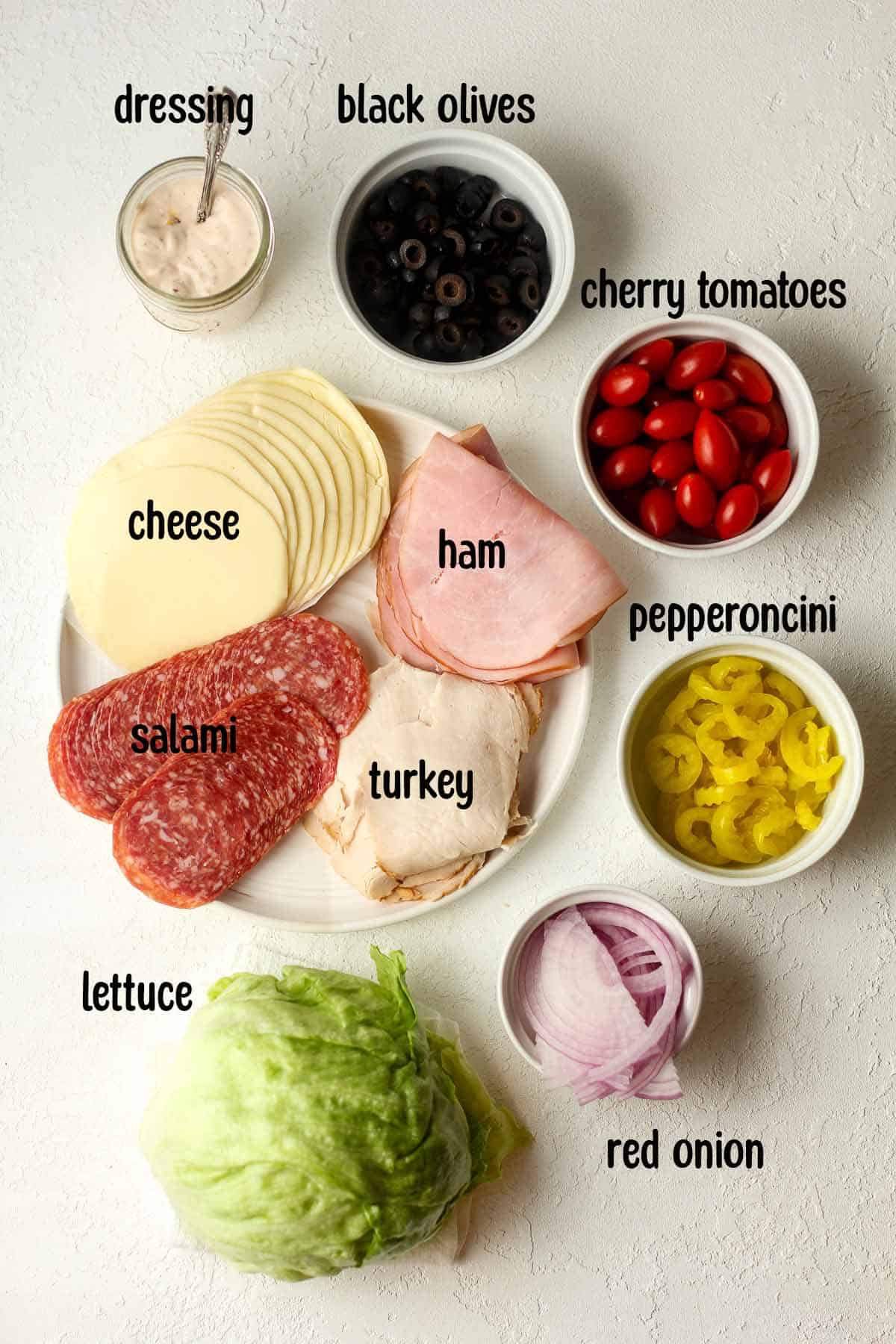 The labeled ingredients for the grinder salad.
