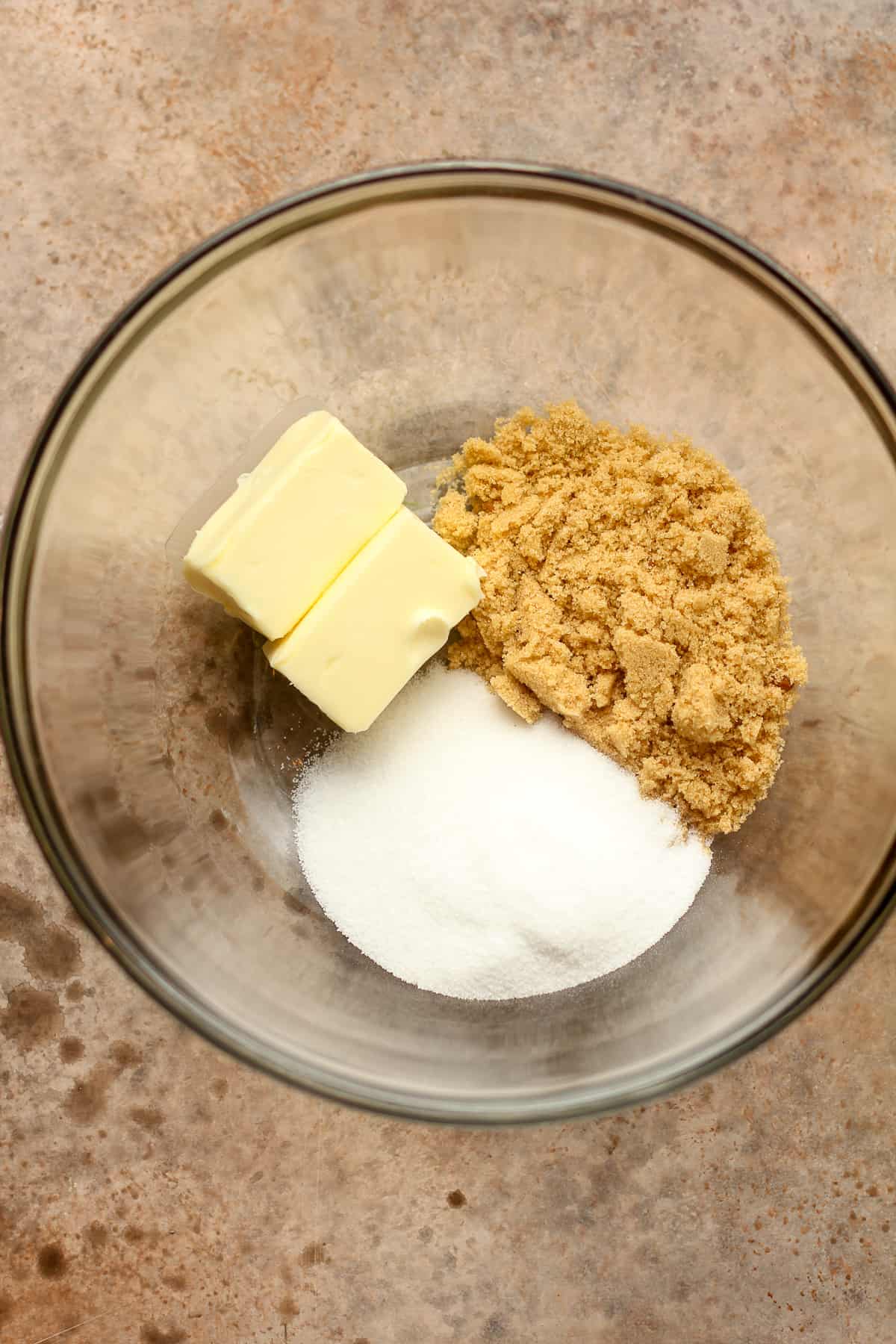 A bowl of the sugar and butter.